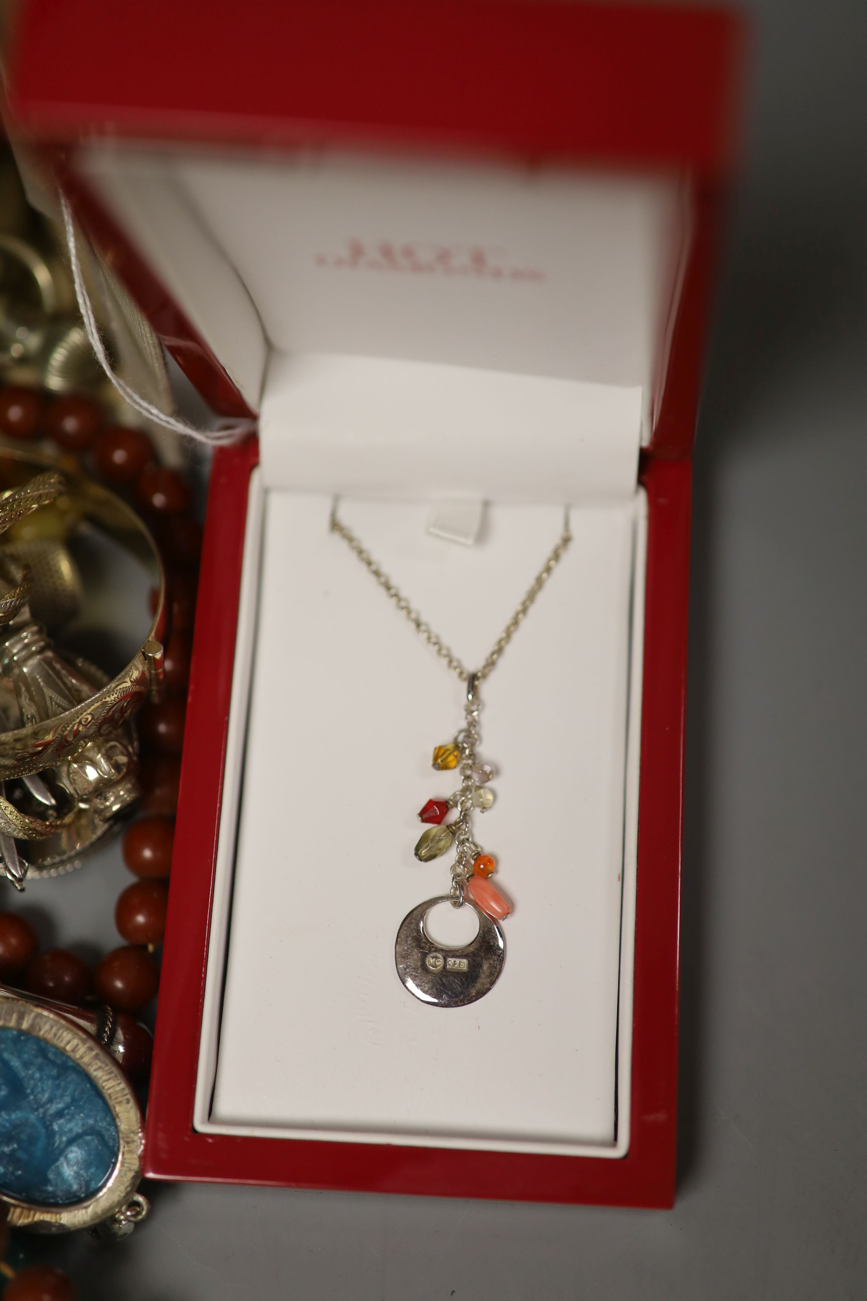 A quantity of mixed jewellery and watches including silver charm bracelet and other silver jewellery, Elgin and Waltham pocket watches, silver condiment etc.